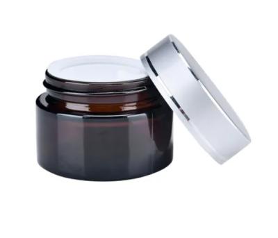 China 20g Personal Straight Side Silver Aluminum Cap Skin Care Cream Glass Black Jars For Cosmetic for sale