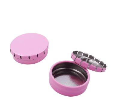 China Small Round Mini Metal Click Clack Tin Candy Candy Storage Can for sale