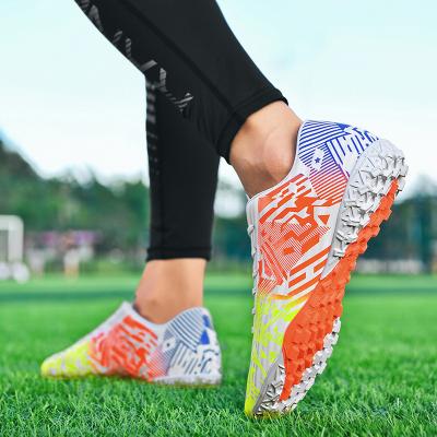 China Custom Rubber Mens Soccer High Ankle Soccer Shoes Soft Bottom Women Men Soccer Shoes Booties Non-slip Shoes Training for sale