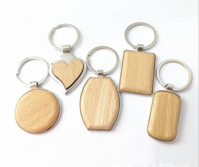 China Wholesale Stain Beech Wooden Key Chain Laser Logo Advertising Wooden Key Chain Key Chain for sale