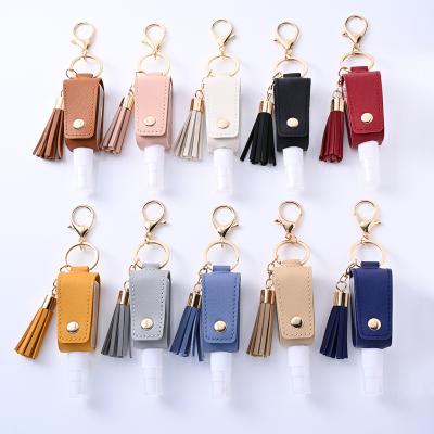 China Retail Multi Color PU 30ML Tassel Disinfecting Alcohol Portable Leather Perfume Holder Key Chain With Empty Spray Bottle for sale