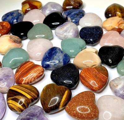 China Europe Wholesale Natural 25Kinds 30mm Swollen Gemstone Reiki Pocket Heart Crystal Heart Carving Hand Carved For Decor Stone Gift for sale