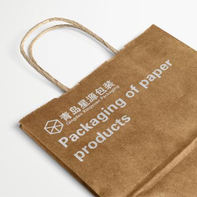 China Recycled Materials Kraft Paper White Paper Bag With Handle Custom Printed Shopping Paper Bag for sale