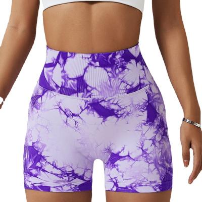 China Antibacterial ladies tie dye fitness yoga shorts elastic high waisted sport shorts crack! crack! hip seamless gym pants for sale