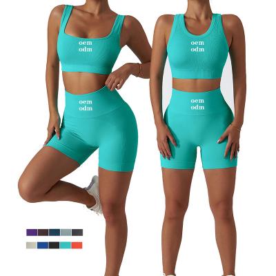 China Breathable Custom Wholesale Gym Wear Ribbed Seamless Two Piece Short Tights Yoga Set For Sports for sale