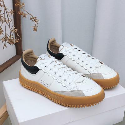 China 2022 fashion trend women sneakers platform shoes high quality stitching design casual men and women sneakers for sale