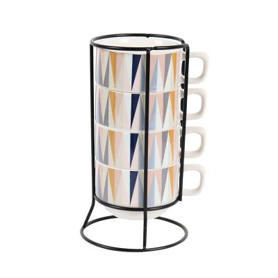 China Viable Creative Ceramic Mugs Set With Geometric Pattern Set Of 4 Espresso Stackable Coffee Mugs With Iron Stand for sale