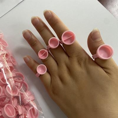 China 100pcs/bag Disposable Pink Plastic Tattoo Pigment Ring Ink Cups Holder Tools Eyelash Extension Glue Rings S/M/L for sale