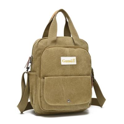 China Fashion Outdoor/Casual Men's Short Backpack Simple Backpack Men's Canvas Messenger Shoulder Bag for sale