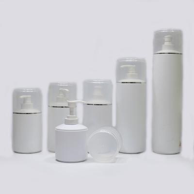 China 300ml 400ml 1000ml Cosmetic Plastic White HDPE Round Bottle With Pump For Shampoo And Lotion Cream And Cosmetic Bath Shower for sale