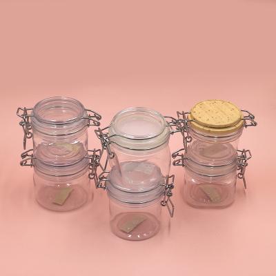 China 100ml 150ml 200ml 250ml Stainless Steel Cosmetic Lock Handle Clear Custom Face Mask Airtight Pet Clay Printing Plastic Jar In Stock for sale