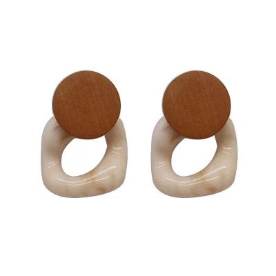 China Hot Elegant Resin Circle Earring Fashion Hollow Out Circle Hollow Simple Female Wooden Earring For Women for sale