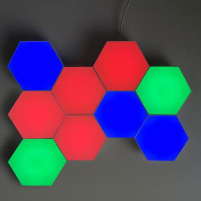 China Modern 2 different control methods color LED wall lamp hexagonal touch and 10 PCS honeycomb remote control led light for sale