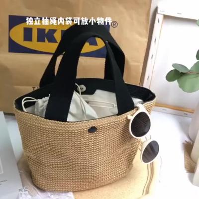 China Fashion Classic Creative Texture Bucket Summer Beach Tote Bag Straw Handbags For Chic Casual Women for sale