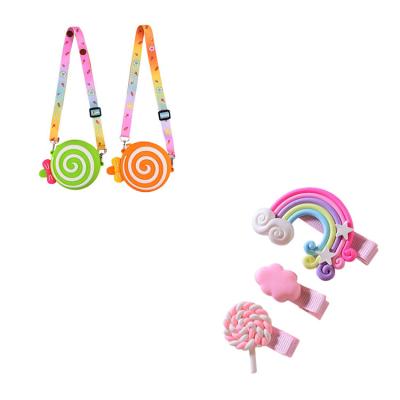 China New fashion design silicone cross bag fashion and soft lollipop shape cute bags kids pinch little girls for sale