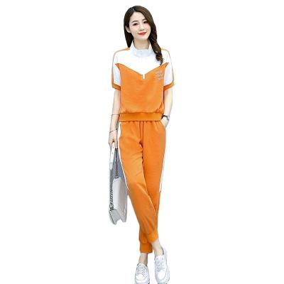 China Fashion QUICK DRY early autumn color contrast girl leisure movement easy splicing polyester fiber suit for sale