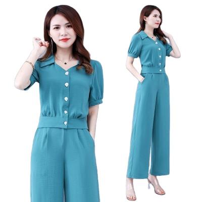 China Lady QUICK DRY large size age temperament solid color reduction splicing European style ventilation polyester fiber suit for sale