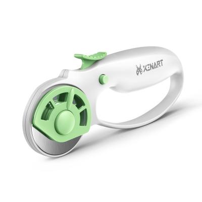 China Cut neattly and quickly Xinart 45mm rotary cutter with 2 spare blades for fabric cutter with ergonomic safety comfort classic buckle for sale