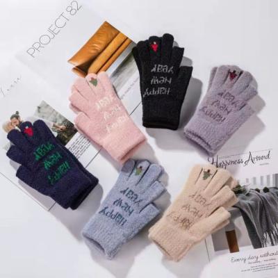 China Simply 2021 Winter Magic Touch Screen Gloves Men Women Warm Stretch Knitted Wool Mittens Acrylic Gloves for sale