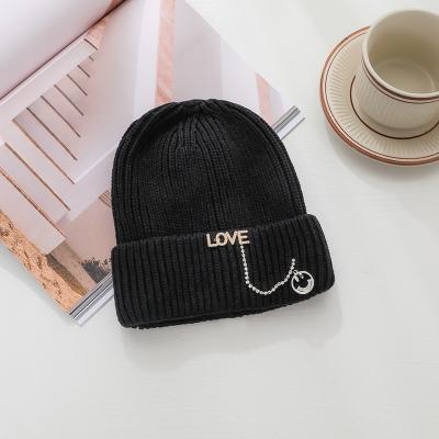 China New Plain Hand Knitted COMMON Beanie With Custom Hats Brand Tags for sale