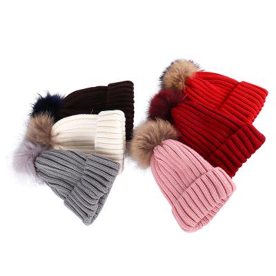 China Custom Fur Pom Knitted Beanie Hat COMMON Winter Mix Color Caps Knit Hat For Women Winter Warm for sale