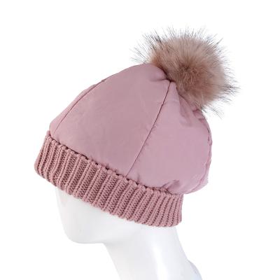 China COMMON Faux Fur Pompom Hats Women Winter Down Cotton Beanies Fur Pompom Hats for sale