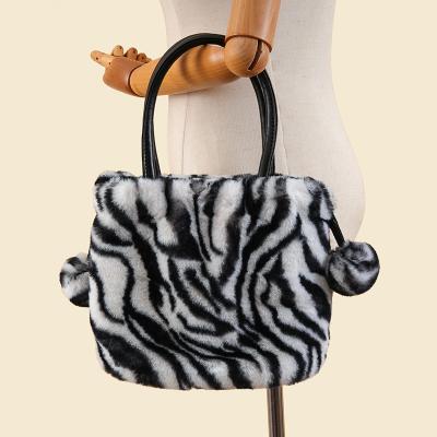 China 2021 New Winter Soft Fashion Women's Fur Plush Handbag Designer Ladies Zebra Pattern Luxury Clutch for sale