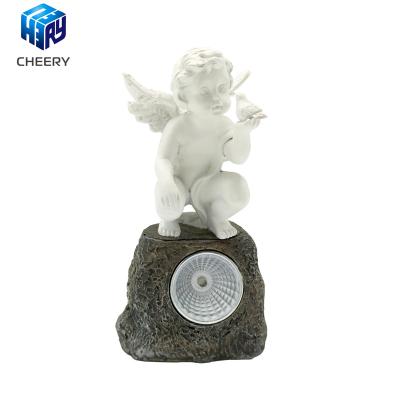 China 2021 Europe New Design Small Garden Resin Figurine Statue With Solar Panel Light In China for sale