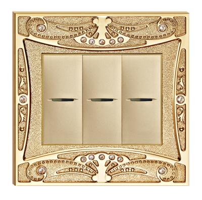 China 24K Gold Plated Finish Forged Brass Wall Switch With Pattern and Diamond for sale