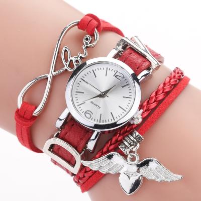 China Factory Non-Specific Wholesale Fashion Wings Elegant Bracelet Ladies Quartz Watches Pendant for sale