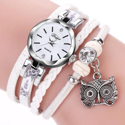 China Non-Specific High Quality Women's Bracelet Watches Armor Retro Strap Owl Pendant Bracelet Quartz Watches for sale