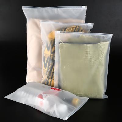 China Ziplock Custom Plastic Clothing Packaging Bags For CLOTHING With Logos for sale