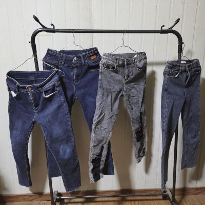 China Fashionable Used Clothing 100KG Mozambique Bale Clothes Wholesale Used Jeans In Mixed Bales Used Clothing for sale