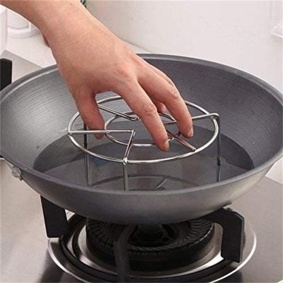 China Wholesale Sustainable Household Stainless Steel Water Separating Multifunctional Anti Steam Rack Tripod Kitchen Cookware Scald Rack for sale