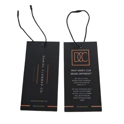 China Customized Customized Sustainable High Quality Paper Cardboard Garment Jeans Emboss Hang Tag Label , Garment Tags Customer Logo Sustainable Simple for sale