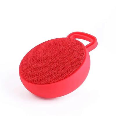 China Mini Wireless Cloth Art Round Newest Feature Gift Bluetooth Phone Outdoor Portable Electronic Cloth Speaker Net Noise Speak MIni Audio for sale