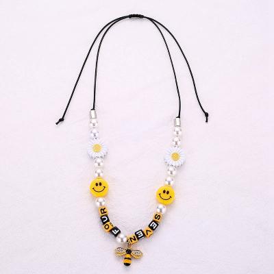 China Hiphop Celebrity Same Style Smiley Necklace Daisy Letters Yellow Beef Strung Necklace for sale