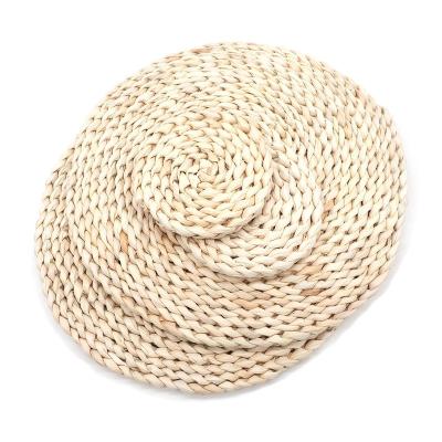 China Homeplus 2022 New Style Sustainable Round Corn Husk Place Mat Handwoven Thick Heat Resistant Thick Natural Coaster for sale