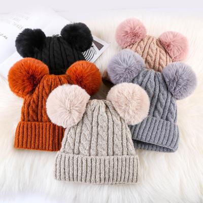 China 2022 New Fashion COMMON Warm Knitted Women's Hat 100% Winter Fur Pom Pom Acrylic Custom Beanie For Women for sale