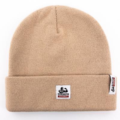 China Wholesale unisex hengxing 100% acrylic woven khaki hat COMMON slapped beanie Knitted Ski Label Custom for sale