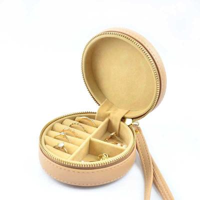 China Custom Logo Jewelry Packaging Display PU Travel Jewelry Boxes Organizer Round Leather Jewelry Storage Case Small for sale