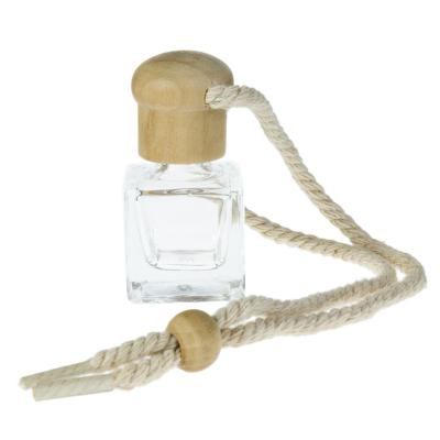 China Hot Selling Personal Care 5ml 10ml Glass Mini Car Empty Perfume Bottle Packing With Wooden Cap for sale