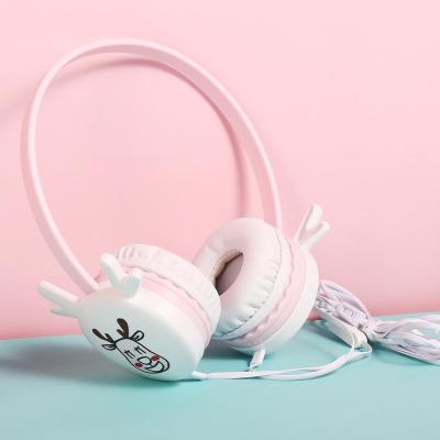 China Hot Selling Pink Perfect Sound Kids Headphones With Cute Antler Cartoon Wired Stereo Headphones For Girls for sale