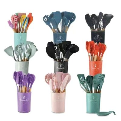 China Wholesale Viable 12 in 1 Kitchen Silicone Accessory Cooking Tools Kitchenware Kitchenware Cocina Silicone Utensils Set with Wooden Handles for sale