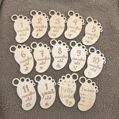 China Newborn Wooden Baby Footprint Europe Laser Cut Craft Monthly Milestone Month Cards For Photo Prop for sale