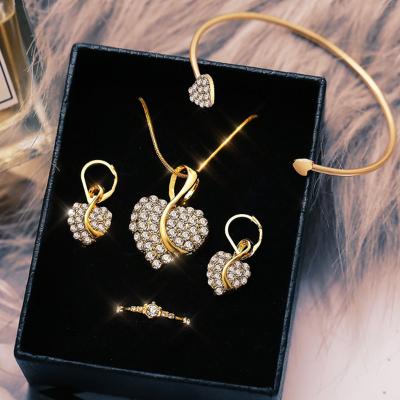 China Heart Romantic Romantic Zircon Necklace Crystal Jewelry Set Simple Heart Earrings And Bracelet Set For Wedding Party Jewelry for sale