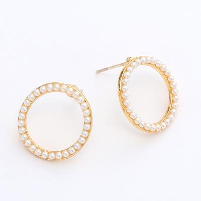 China Temperament TRENDY Metal Fashion INS Round Shape Pearl Earrings Gold Plated Inlaid Jewelry for sale