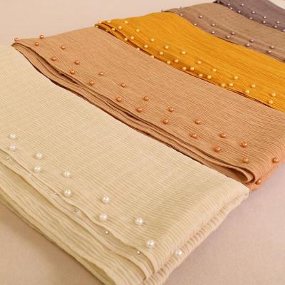 China Newest Pearl Chiffon Scarf Wrinkled Simple Crinkled Muslim Crinkle Pearl Scarf Double Row Chiffon Shawl Nail Pearl Scarf Long for sale