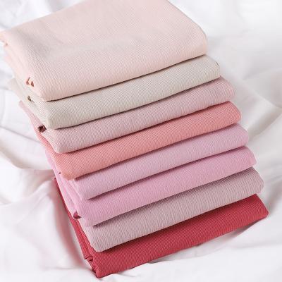 China Wholesale Solid Color Solid Color Scarf Women's Fashion Cotton Canvas Shawl Pleat Newest Scarf Monochrome Natural Women's Scarf for sale