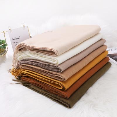 China Newest autumn and winter solid color imitation cashmere scarf long tassel thickened warm scarf monochrome thickened scarf for sale